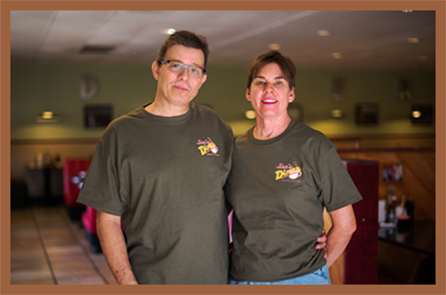 Joan and Joe inside of Joe's Diner.